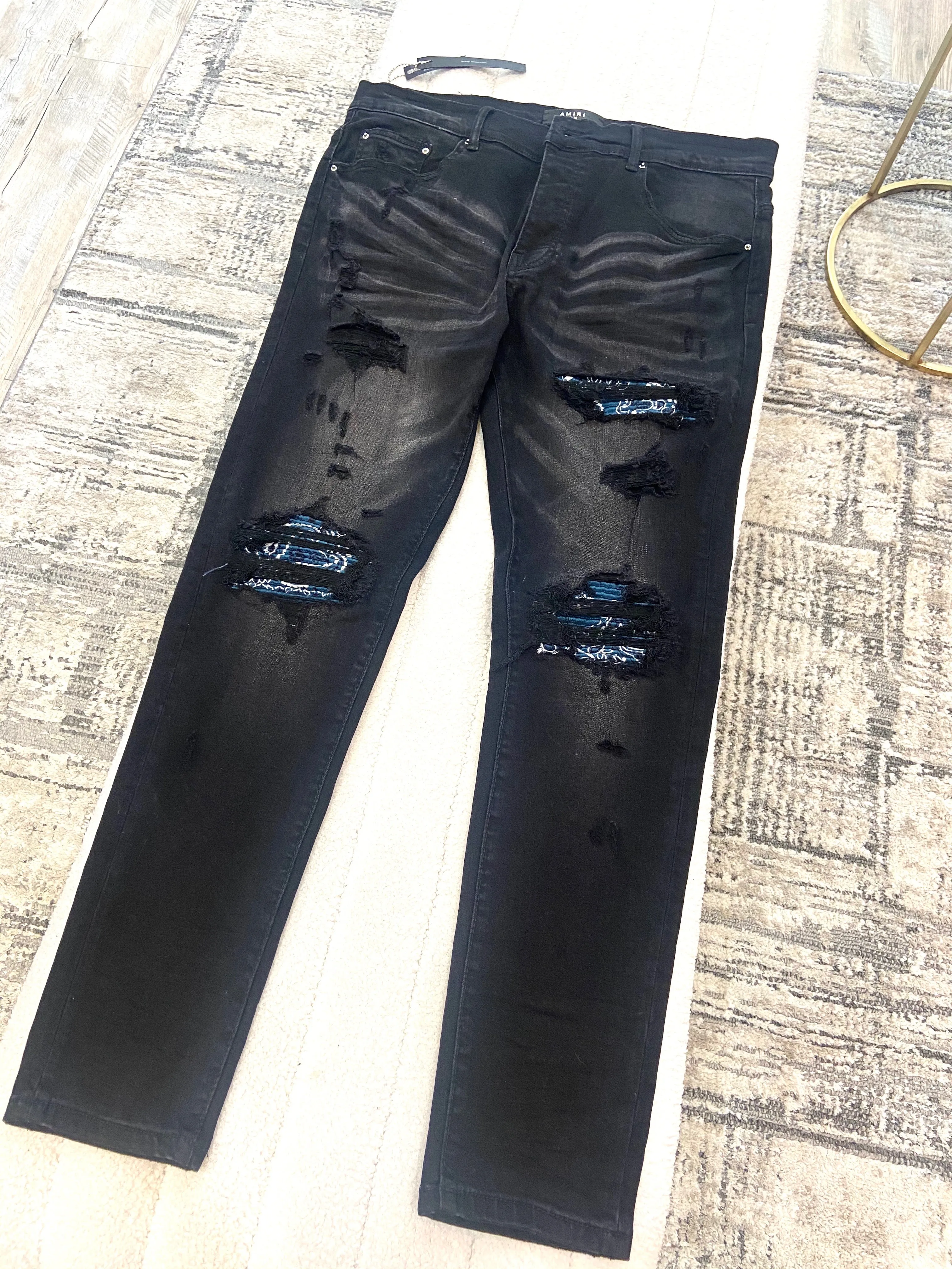 AMIRI DISTRESSED DENIM JEANS