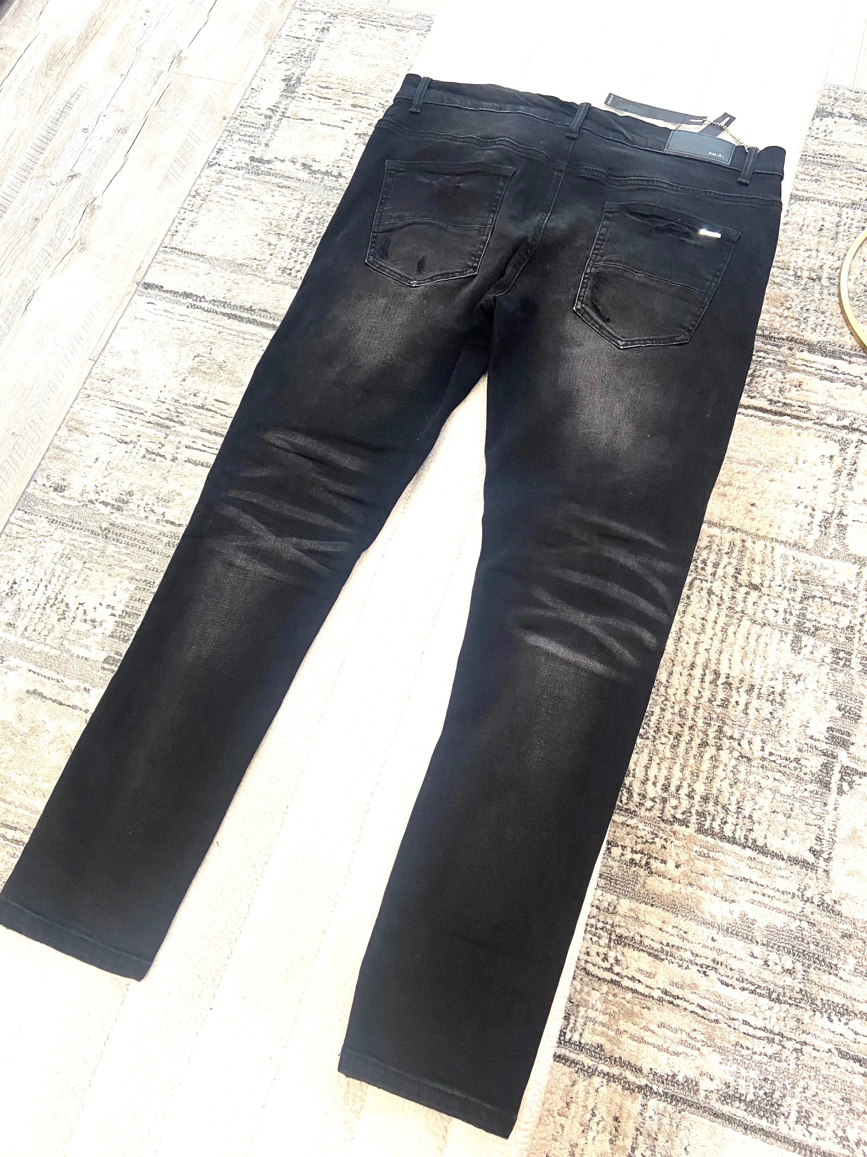 AMIRI DISTRESSED DENIM JEANS