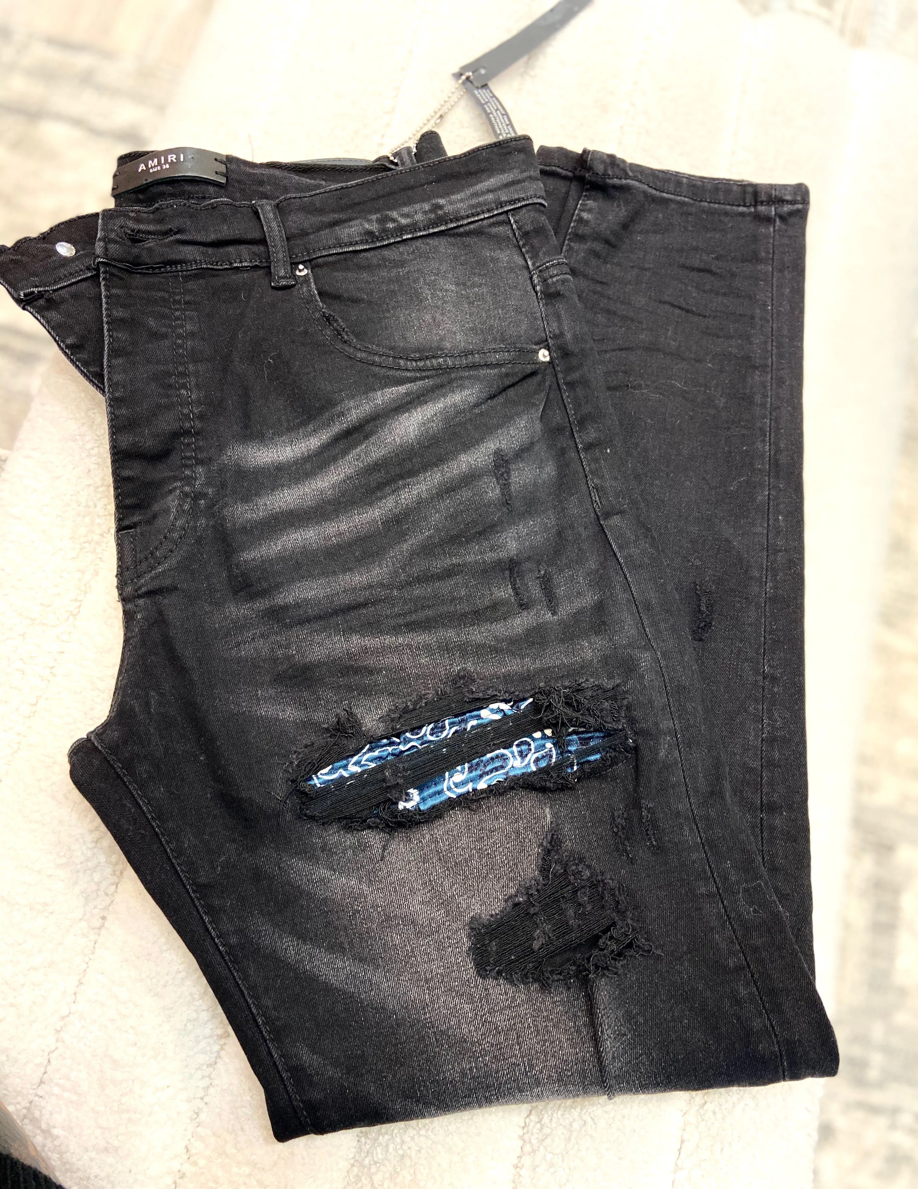 AMIRI DISTRESSED DENIM JEANS